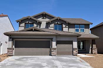 Two story stucco house in Tucson, Arizona - Old Pueblo Home Inspection Services.