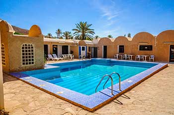 Two story stucco house in Tucson, Arizona - Old Pueblo Home Inspection Services.