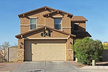 Two story stucco house in Tucson, Arizona - Old Pueblo Home Inspection Services.